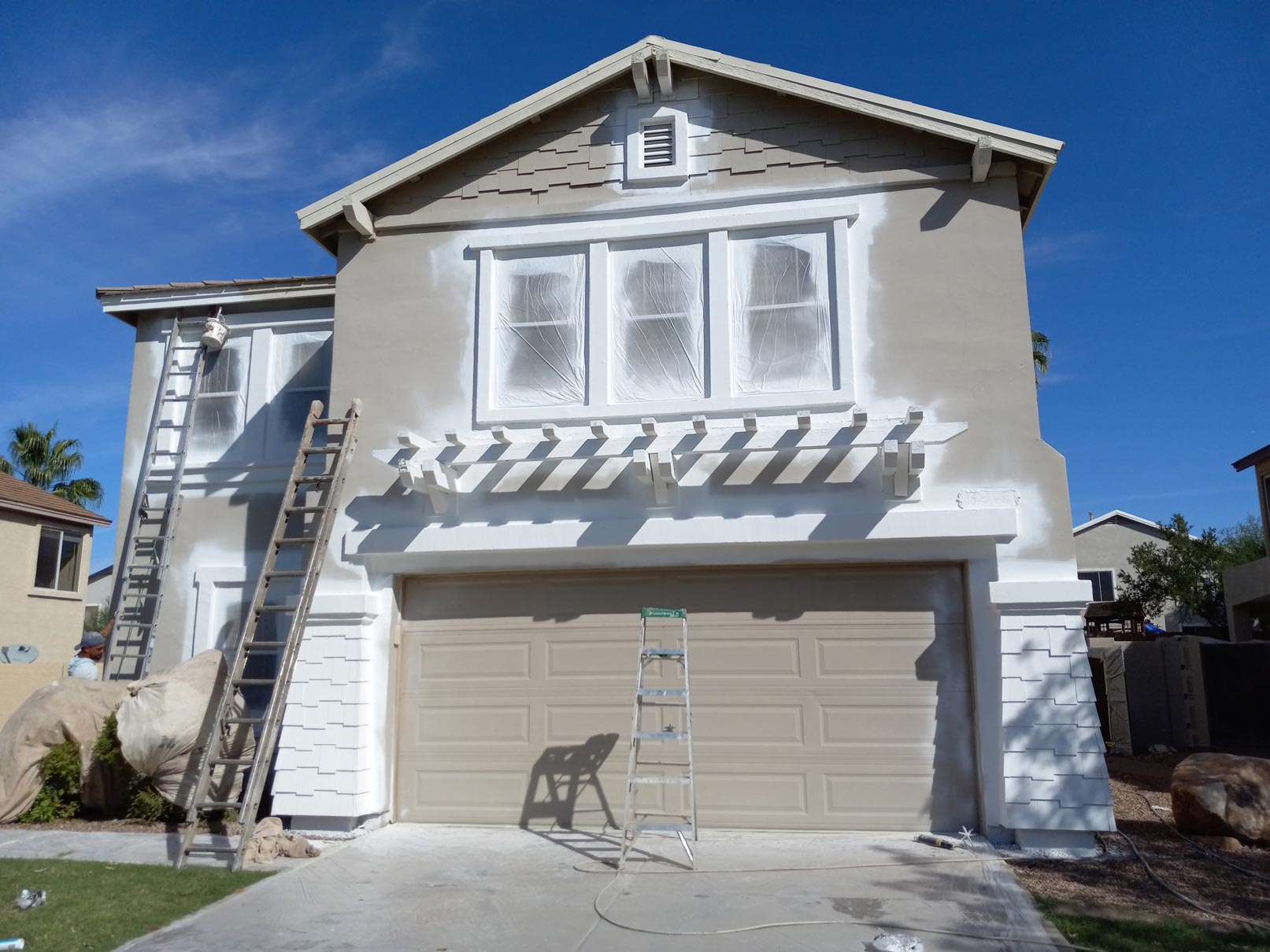 Residential home prepped for exterior painting